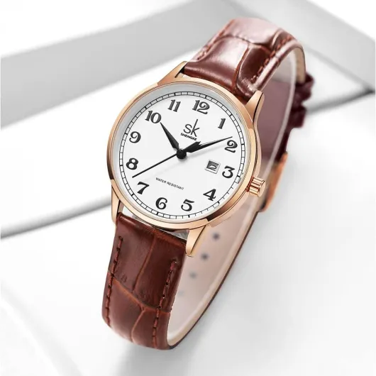 SHENGKE SK Classic Business Women Montres avec Bracelet en Acier Inoxydable et Montre élégante en Cuir véritable pour Dames Rosegold-brown