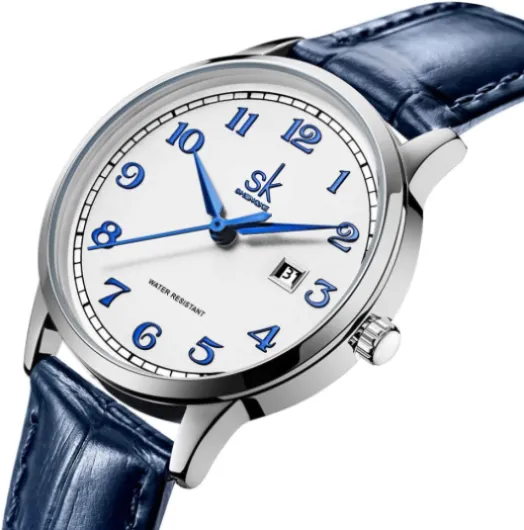 SHENGKE SK Classic Business Women Montres avec Bracelet en Acier Inoxydable et Montre élégante en Cuir véritable pour Dames Arabic Number-blue Leather